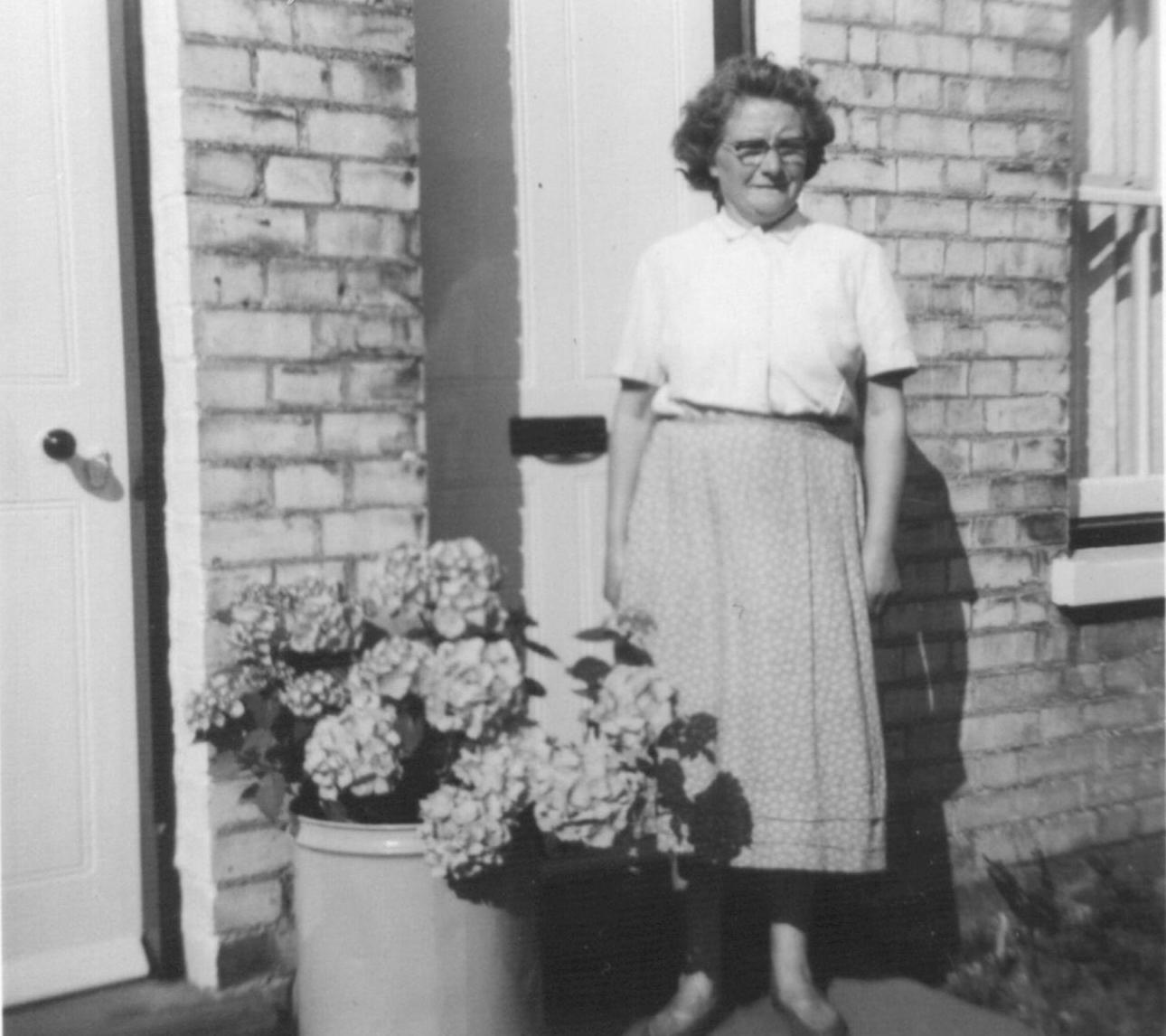 Mrs Beatrice Ling outside her house 27 Railway St. Courtesy of