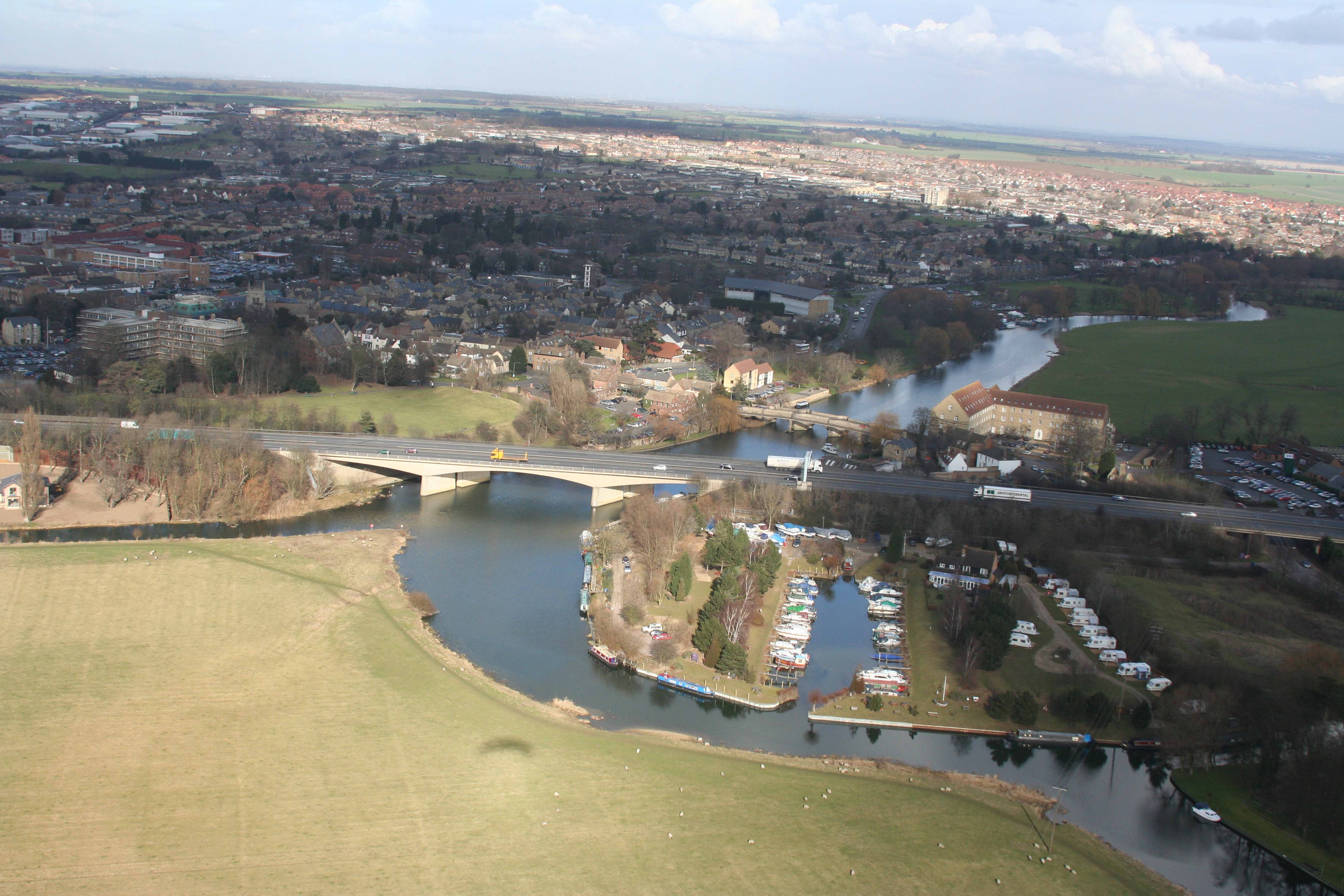 A14 bridge over river Ouse with Huntingdon town bridge in