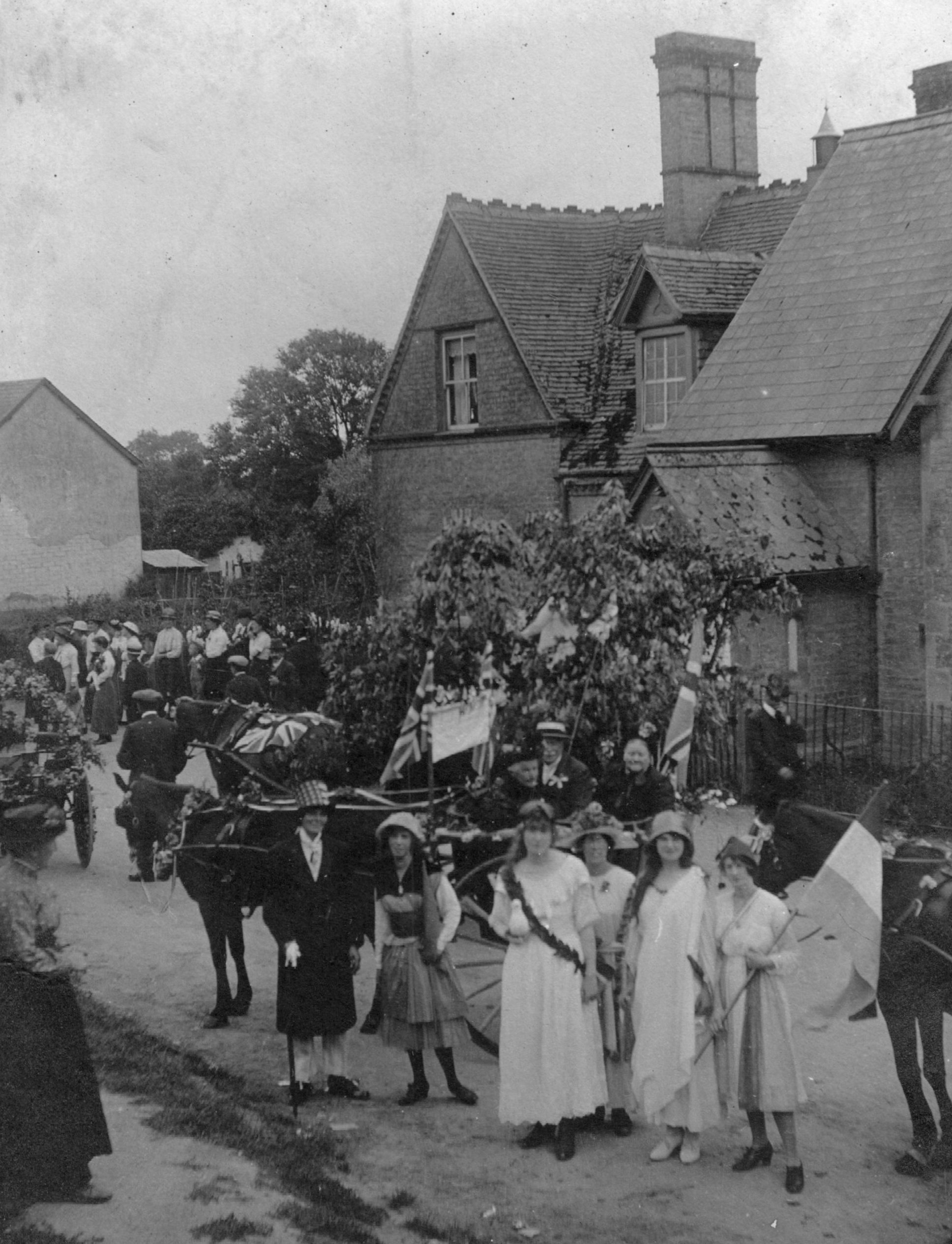 Victory Celebrations in High Street, Orwell following the end of the First  World War. School house in background. | Animal transport, Crowds,  Historic, Recreational, Schools | Orwell